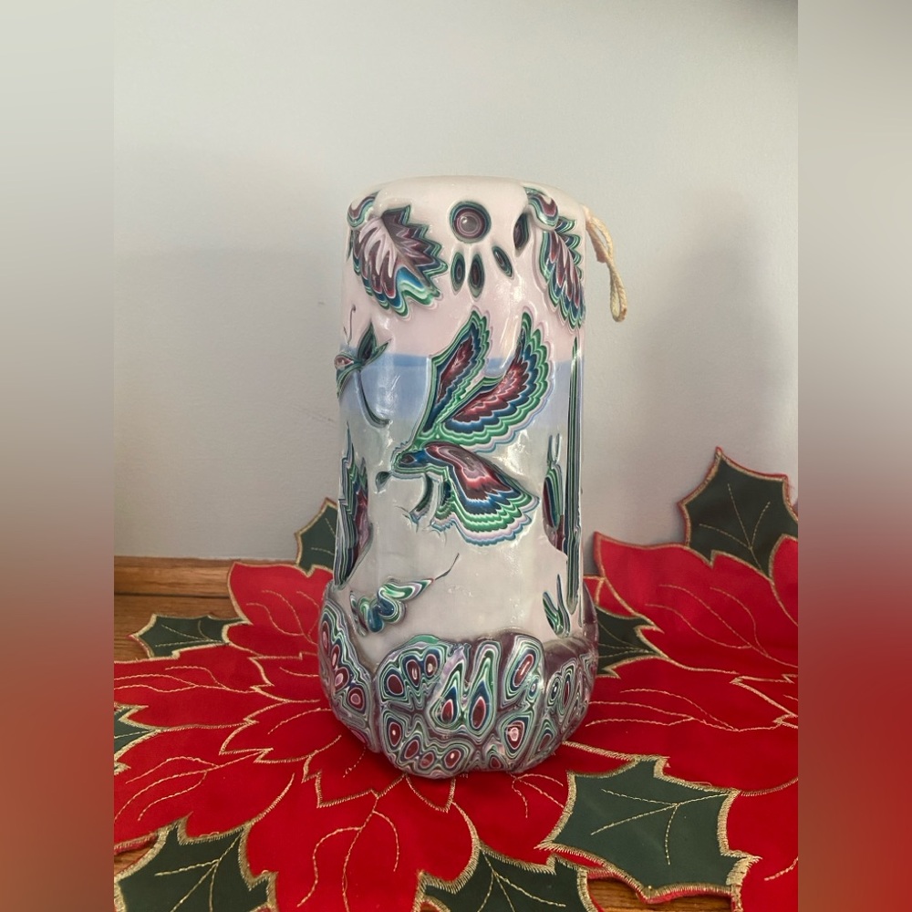 Colorful Carved Candle with Wildlife Design